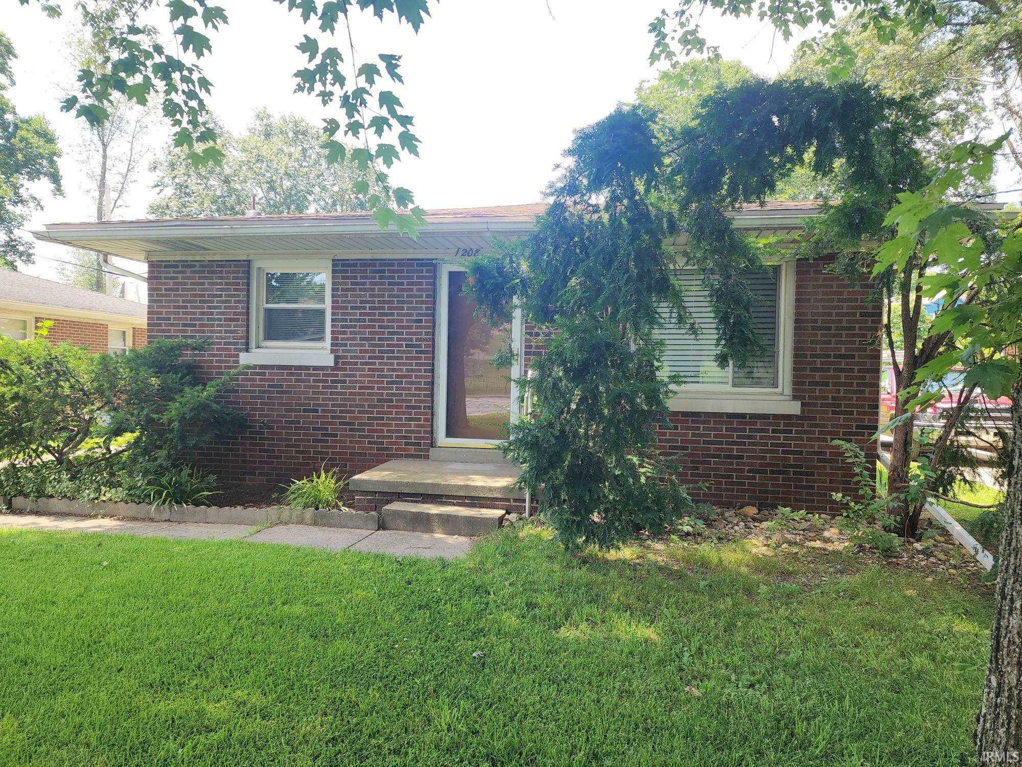 Property Photo: 1208 N Saint Joseph Avenue IN 47720
