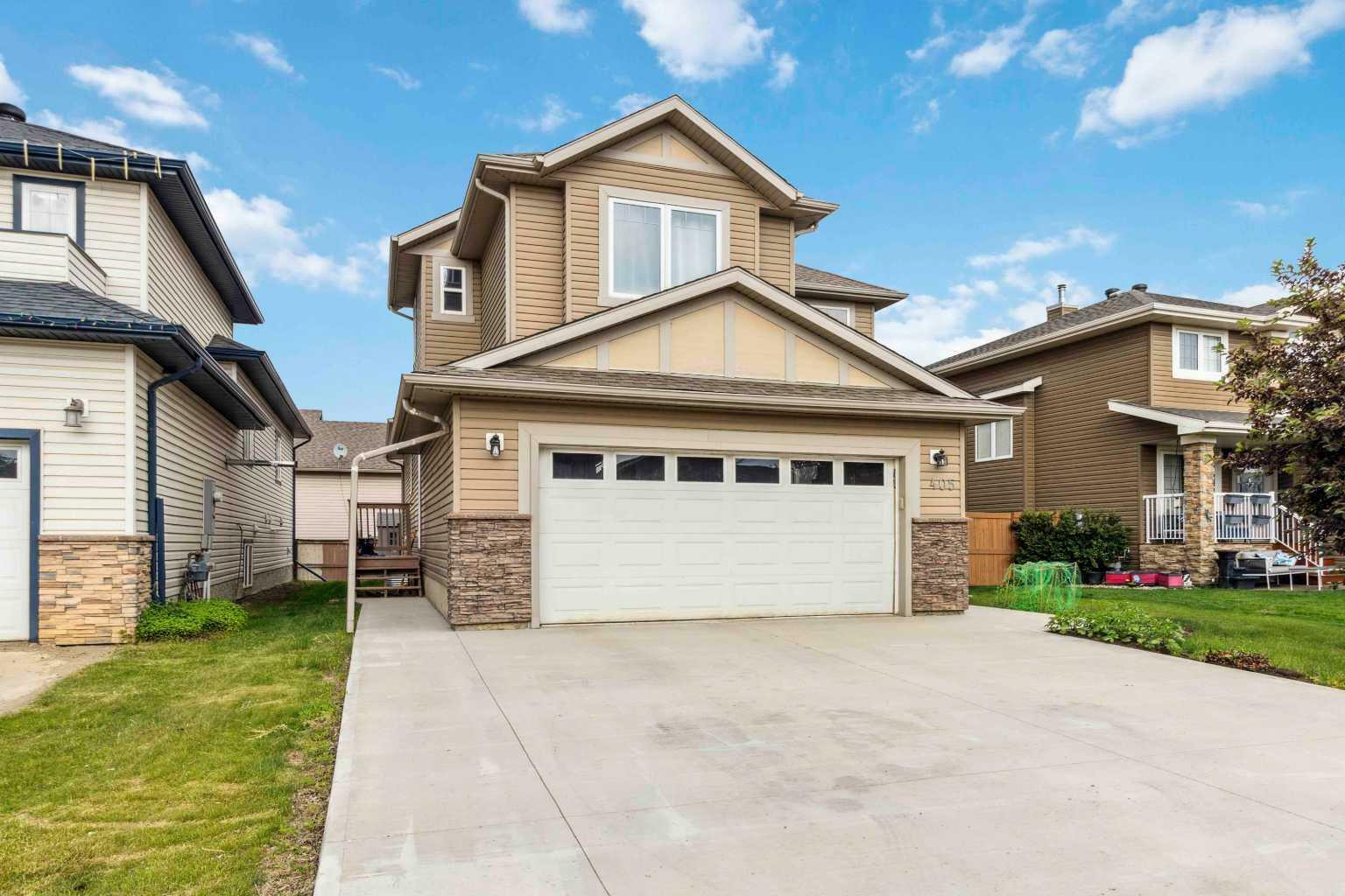 Property Photo: 405 Loutit Road AB T9K 0S3
