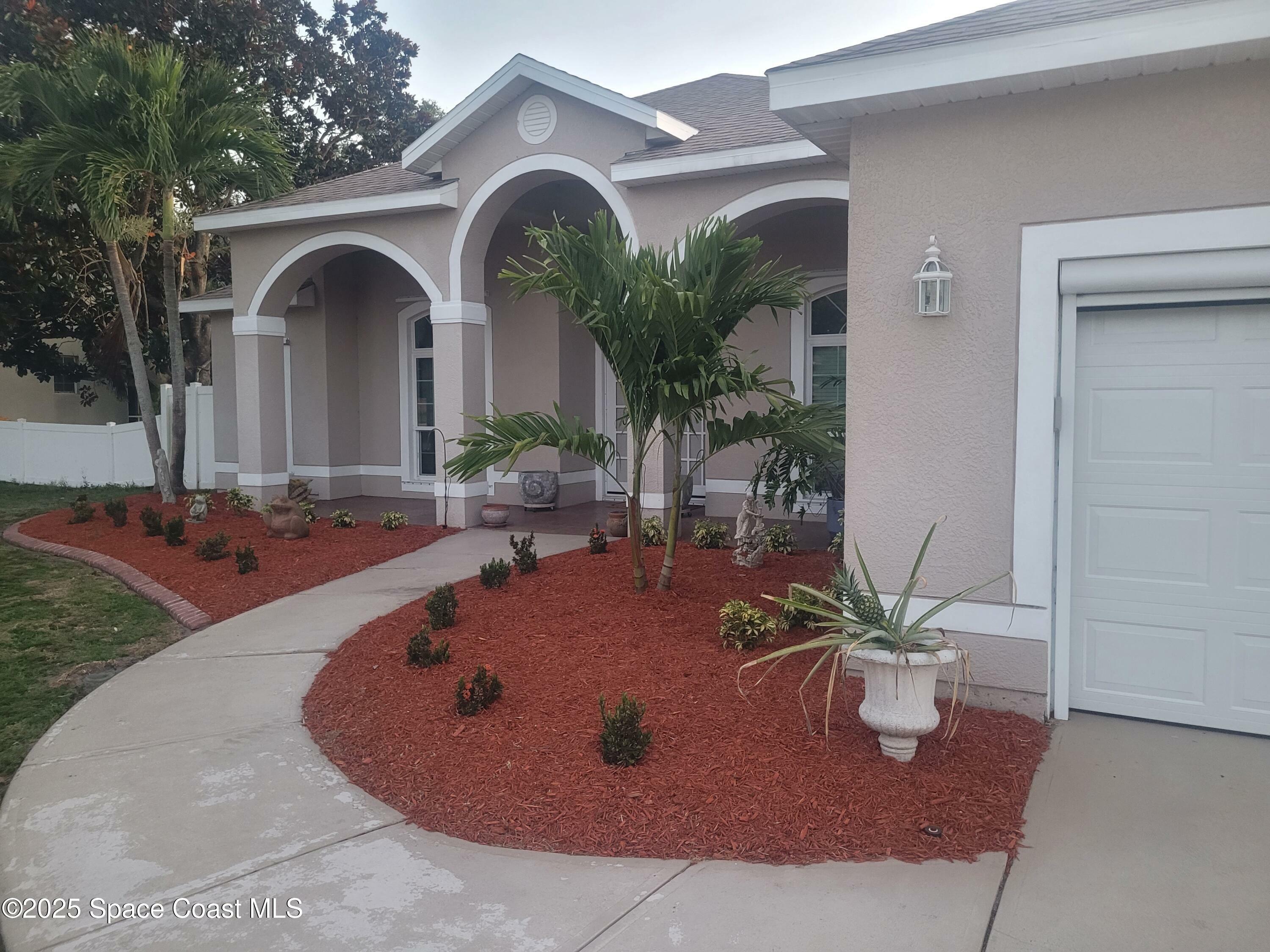 Property Photo: 401 Stonehenge Circle FL 32955