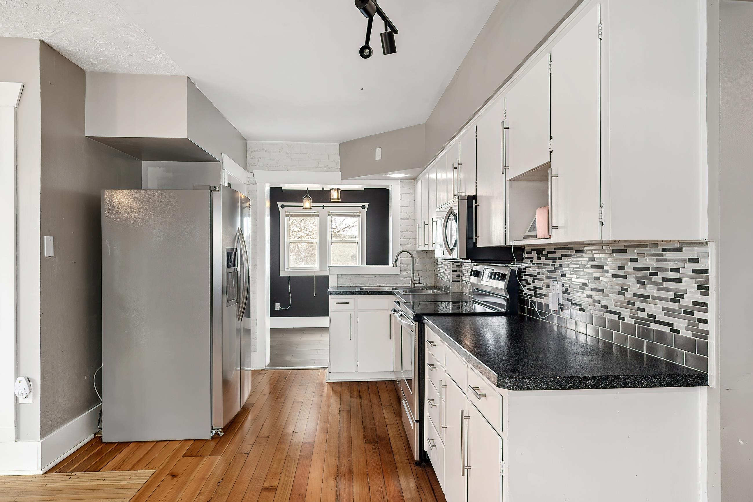 Property Photo:  114 E Glass Ave  WA 99207 