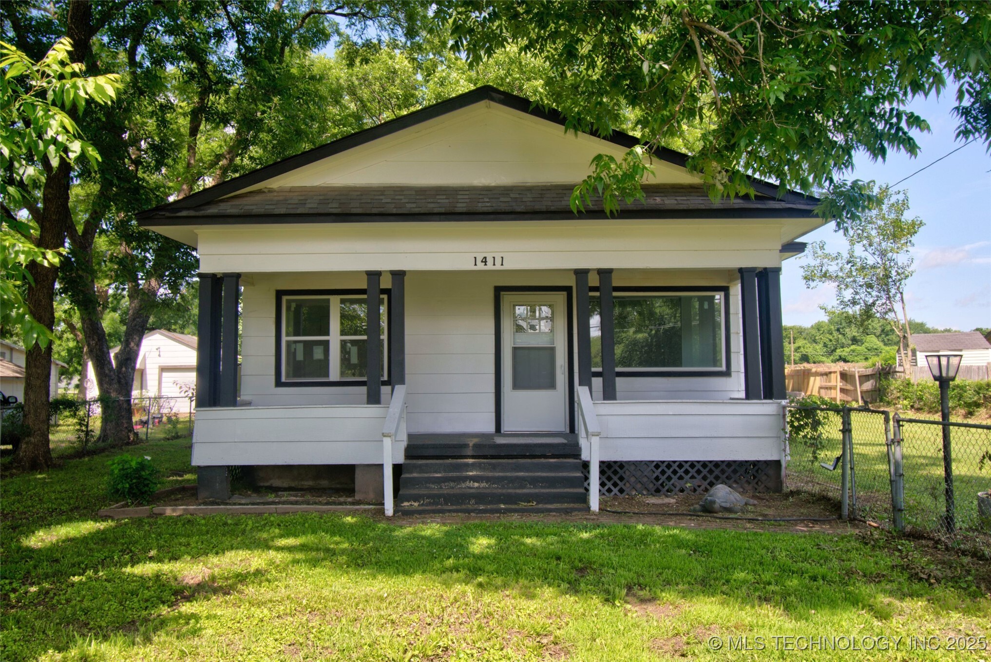 Property Photo: 1411 N 43rd Street E OK 74403
