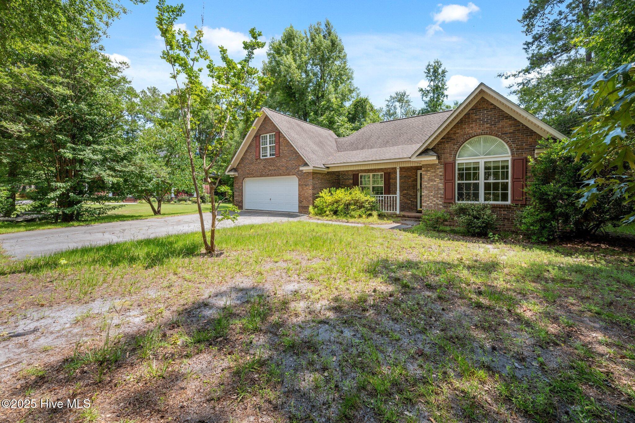 Property Photo:  901 Wood Ridge Court SE  NC 28451 