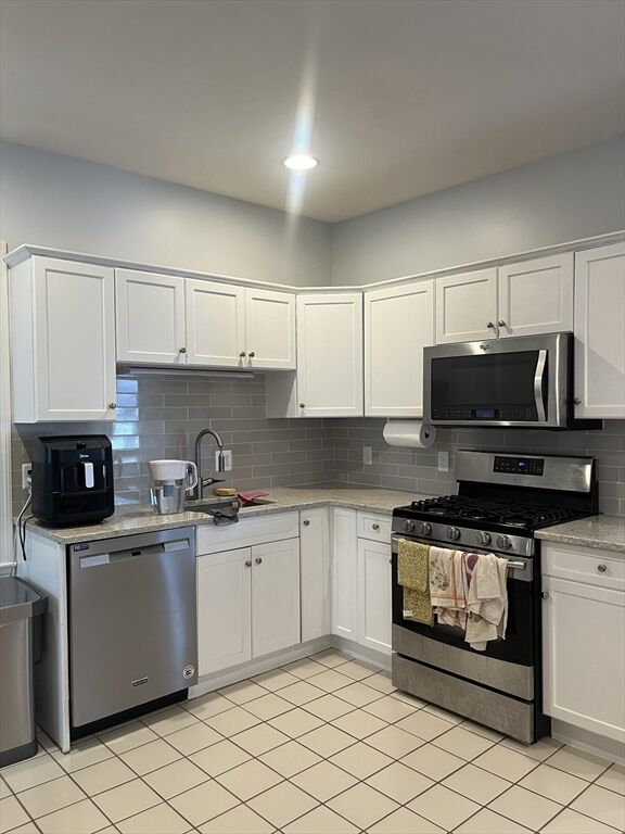 Property Photo: 239 Safford St 1 MA 02170