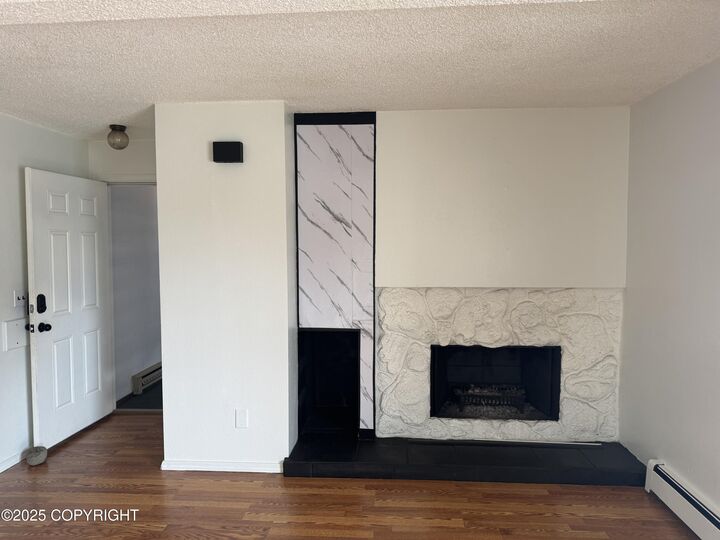 Property Photo:  7068 Weimer Road #3  AK 99502 