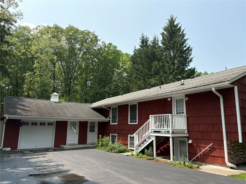 Property Photo: 206 Sapsucker Woods Road NY 14850