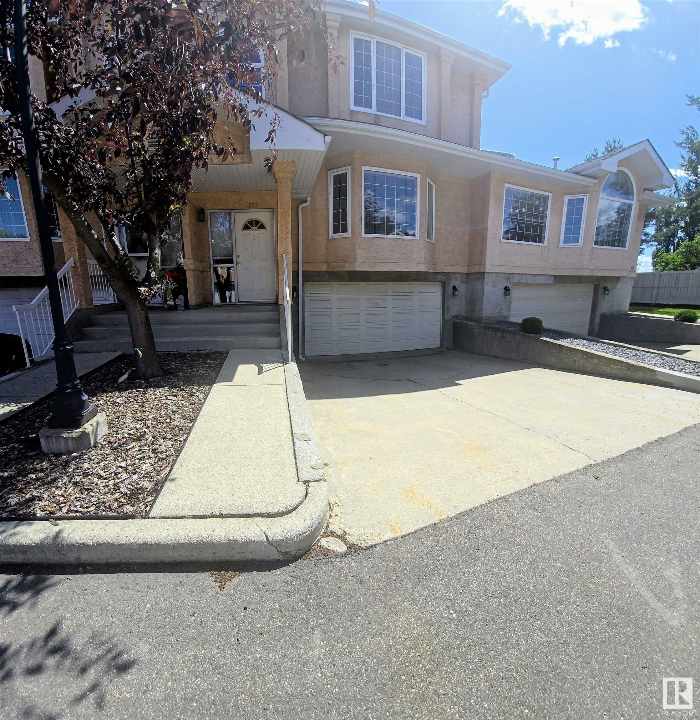 Property Photo: 11115 9 Avenue NW 121 AB T6J 6Z1