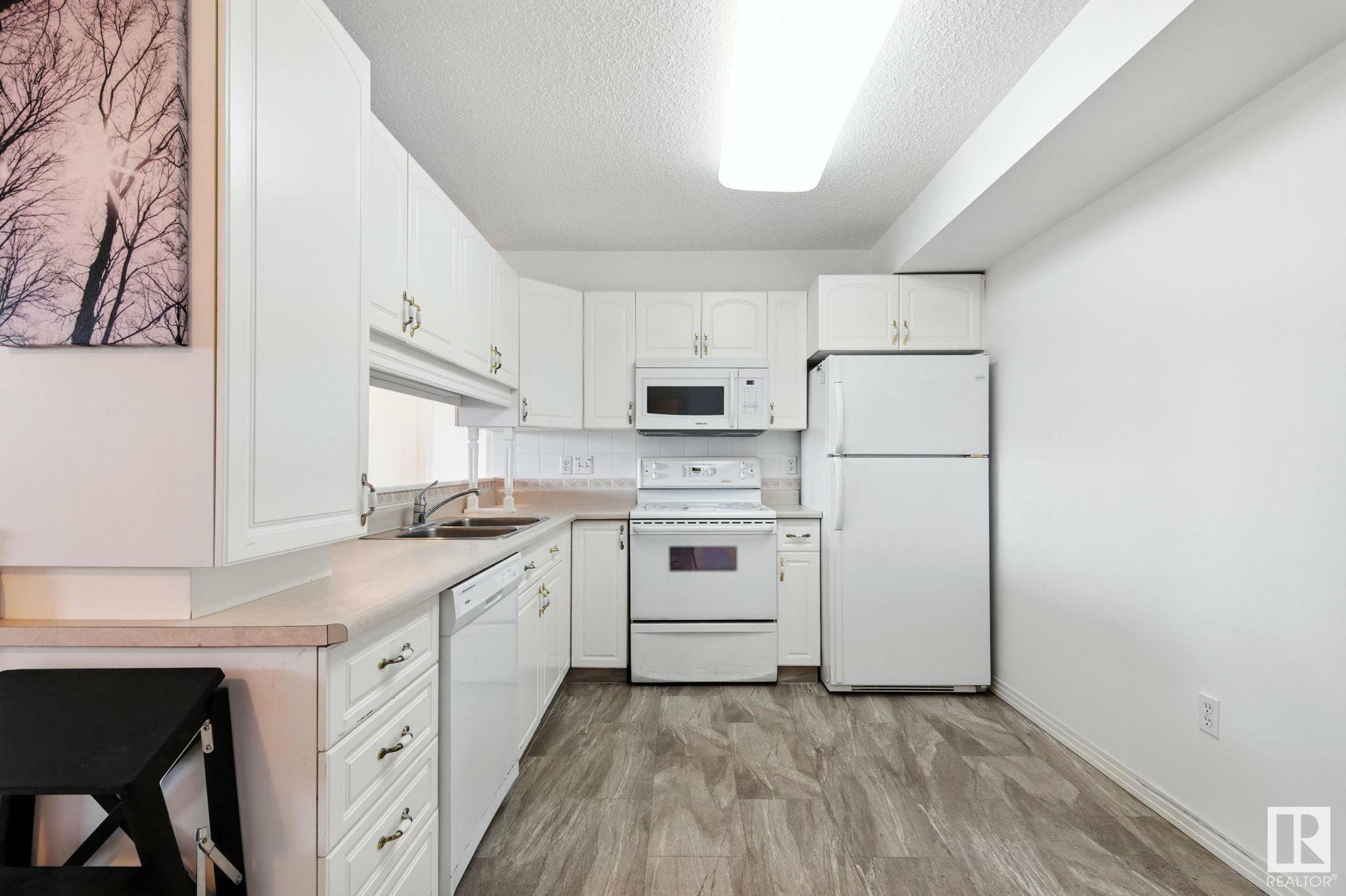 Property Photo: 17150 94A Avenue NW 308 AB T5T 6L7