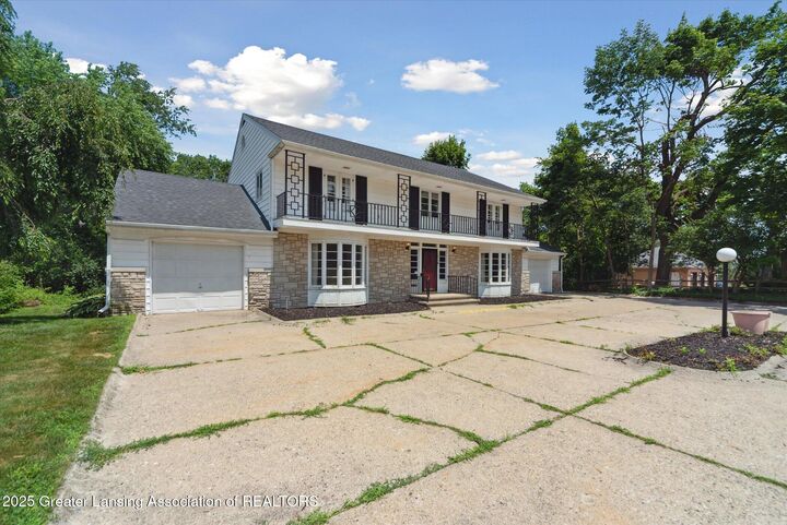 Property Photo:  1516 Moores River Drive  MI 48911 