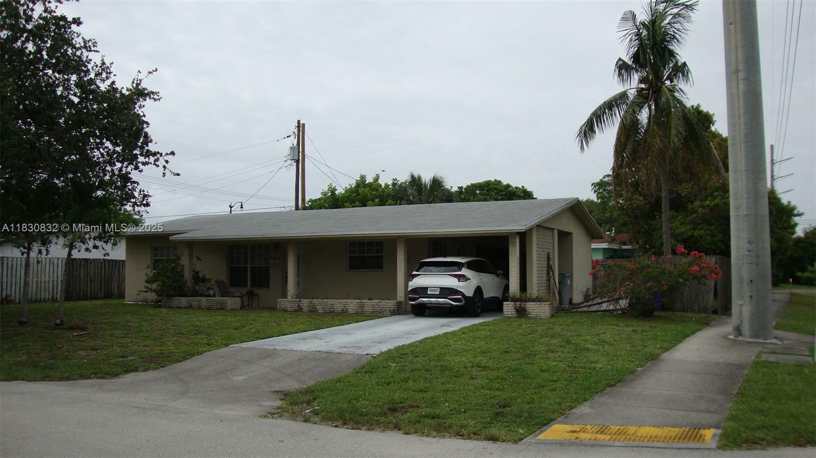 Property Photo: 1500 NE 33rd Ct FL 33064