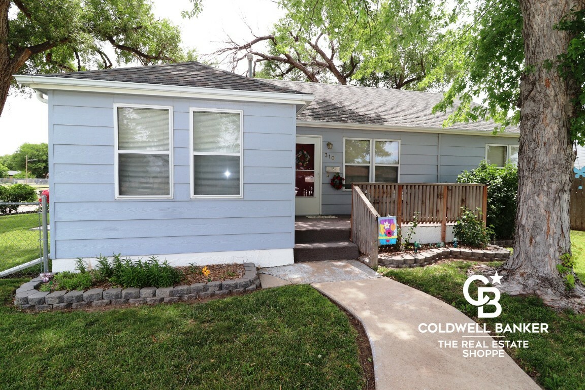 Property Photo:  310 Ballinger Street  KS 67846 