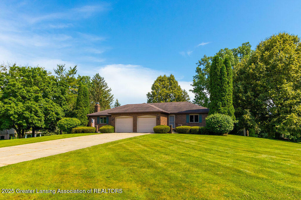 Property Photo:  70 Apple Blossom Lane  MI 48864 