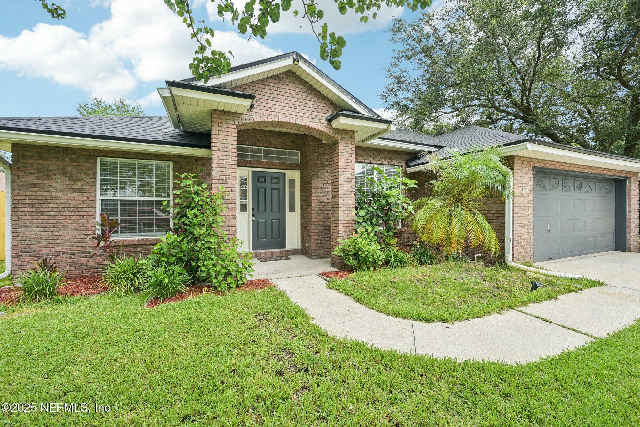 Property Photo: 8761 Redleaf Court FL 32244