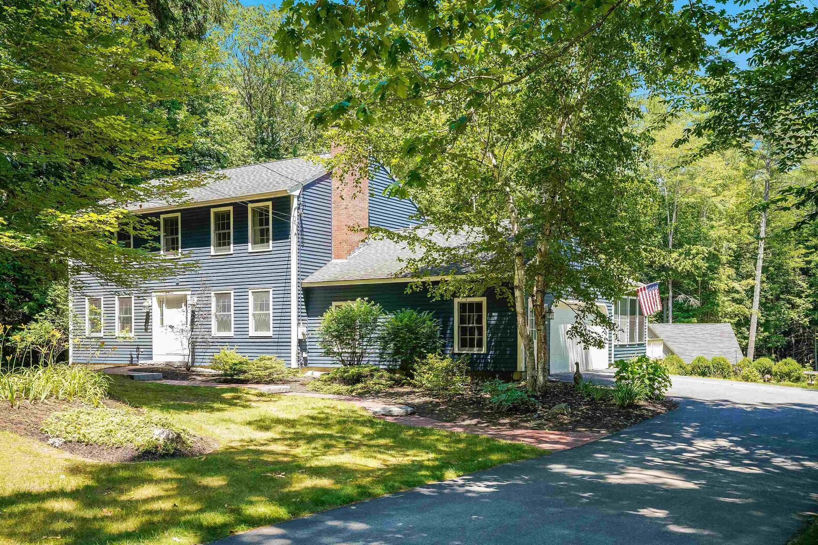 Property Photo: 8 Essex Drive NH 03304