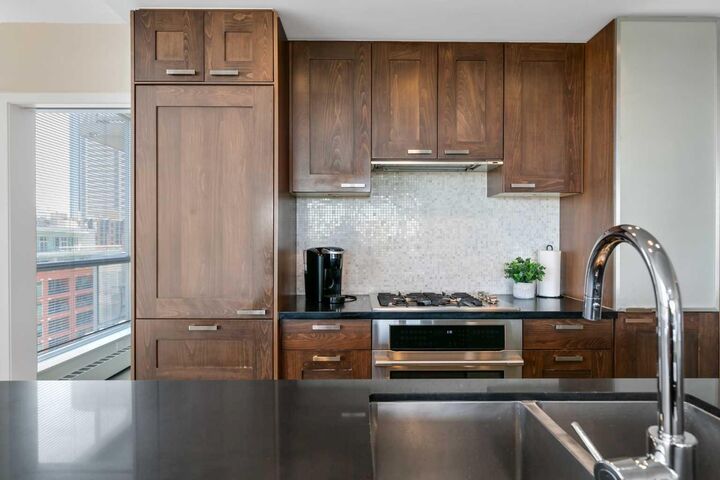 Property Photo:  222 Riverfront Avenue SW 1213  AB T2P 0X2 