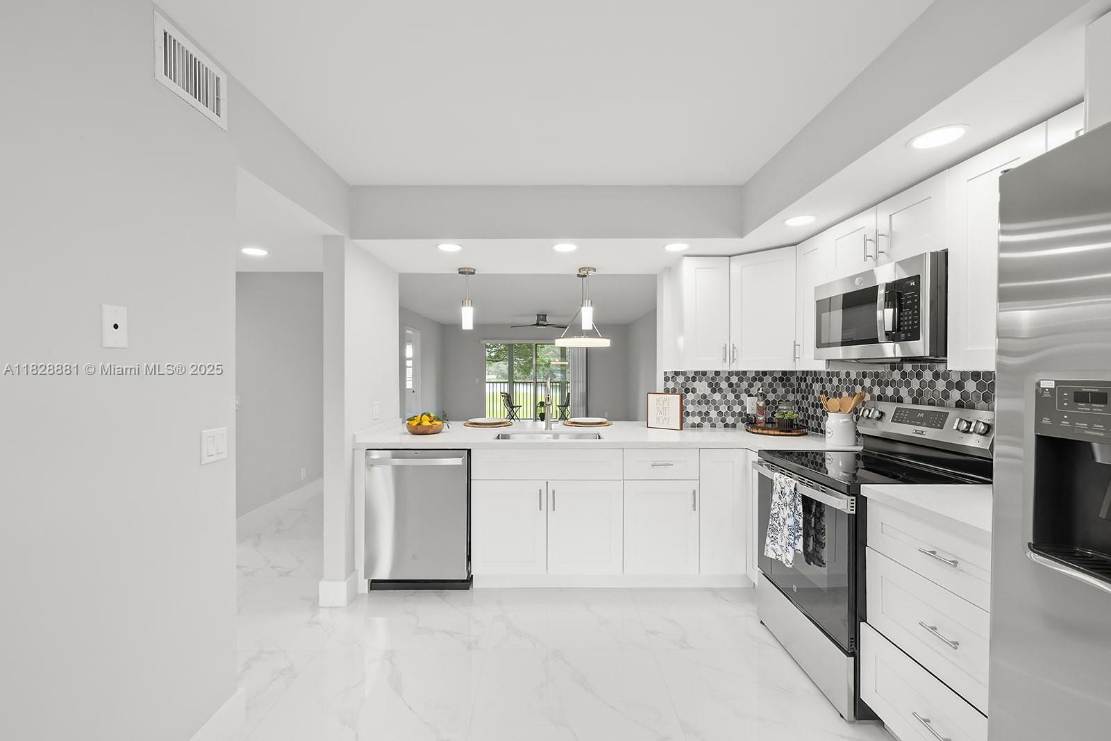 Property Photo: 12500 SW 6th St 206N FL 33027