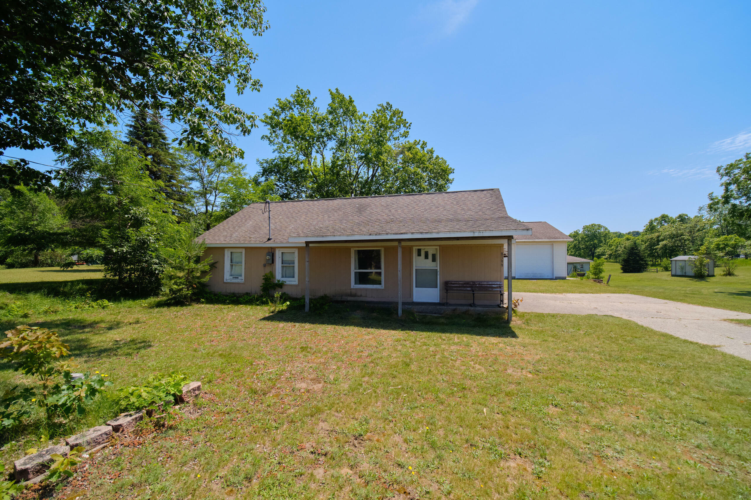 Property Photo:  8399 Lake Street  MI 49614 
