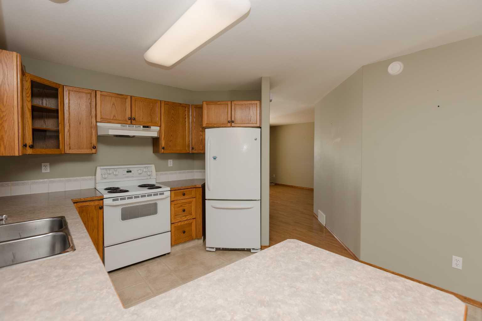 Property Photo: 173 Kingston Drive AB T4P 3V4