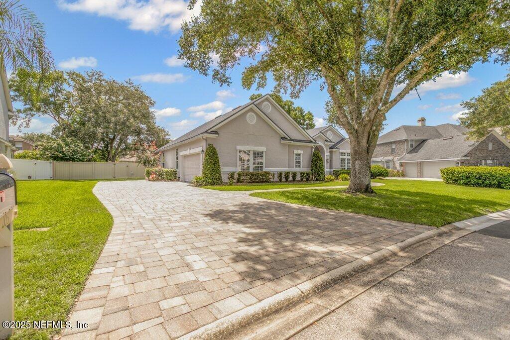 Property Photo: 205 N Checkerberry Way FL 32259