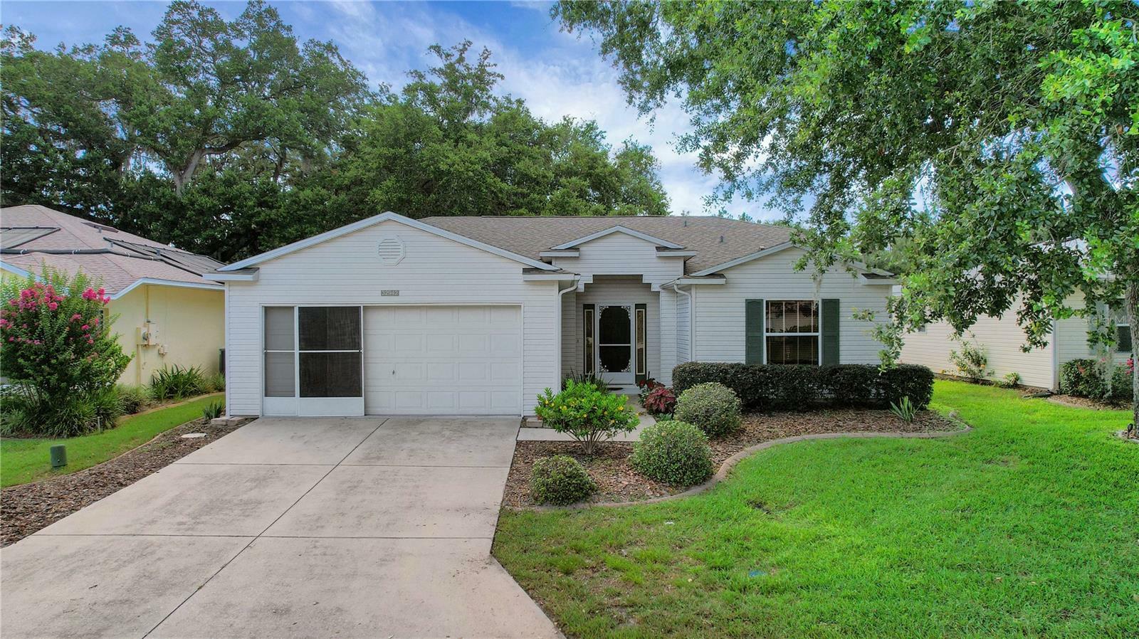 Property Photo: 32942 Rambling Oaks Court FL 34748