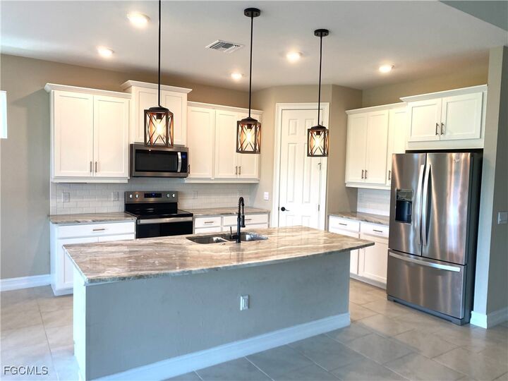 Property Photo: 710 Heather Lake Avenue FL 33993