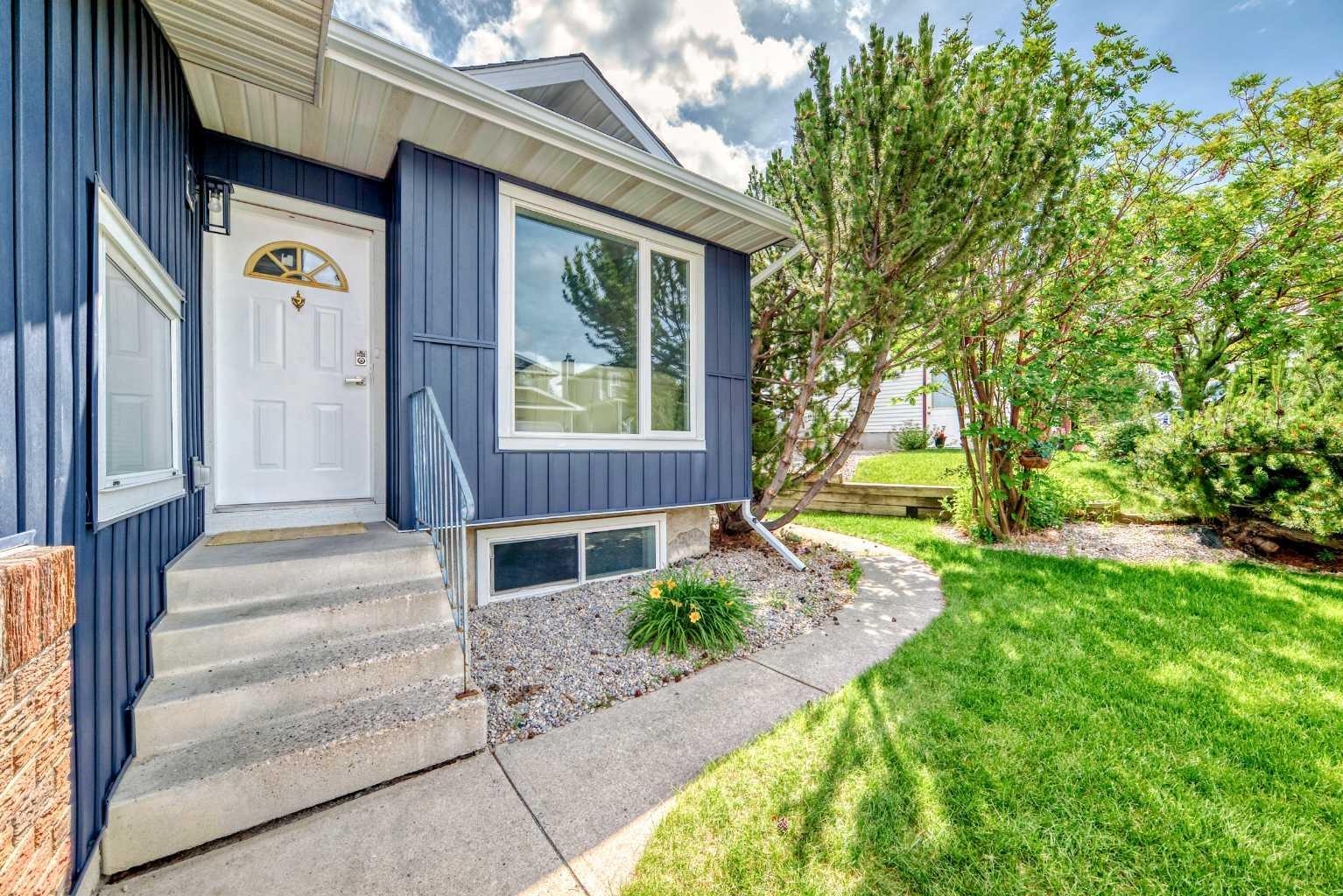 Property Photo: 9744 Sanderling Way NW AB T3K 3R8