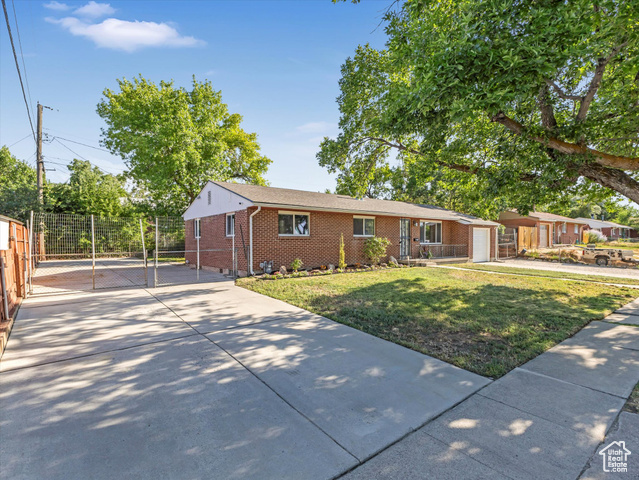 Property Photo: 7645 W Gardenia Ave UT 84044