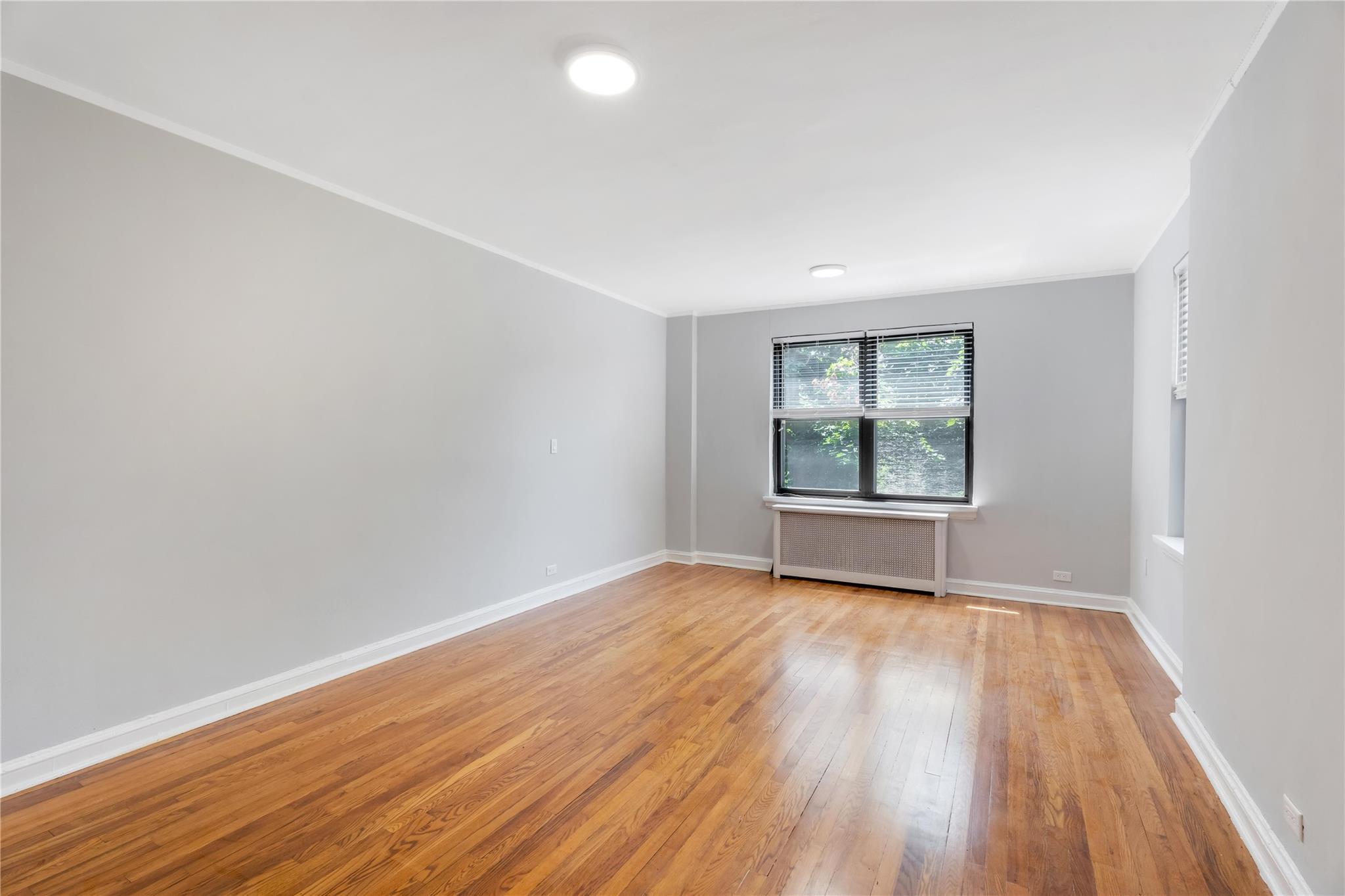 Property Photo:  76-12 Ditmars Boulevard B3  NY 11370 