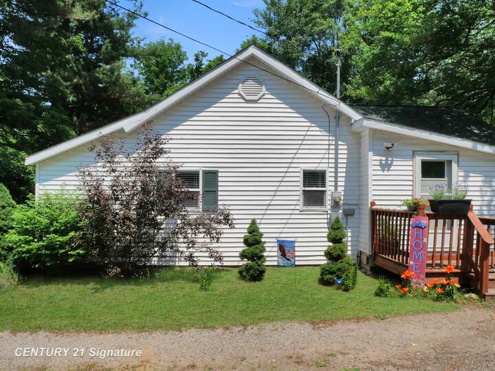 Property Photo:  6538 Tower Line Street  MI 48628 