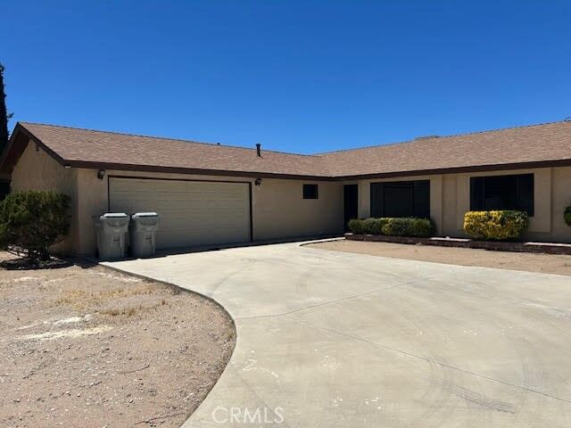 Property Photo:  7980 Kingston Avenue  CA 92345 
