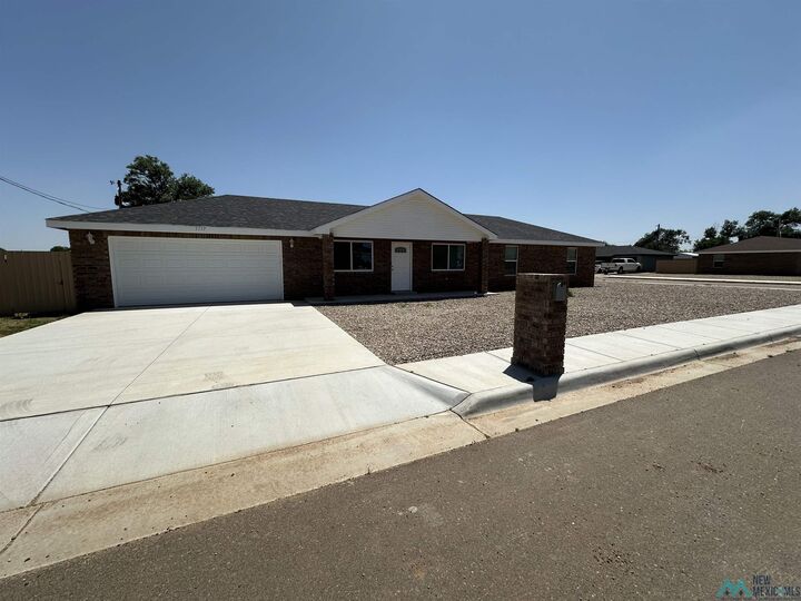 Property Photo:  1117 Cypress Street  NM 88101 