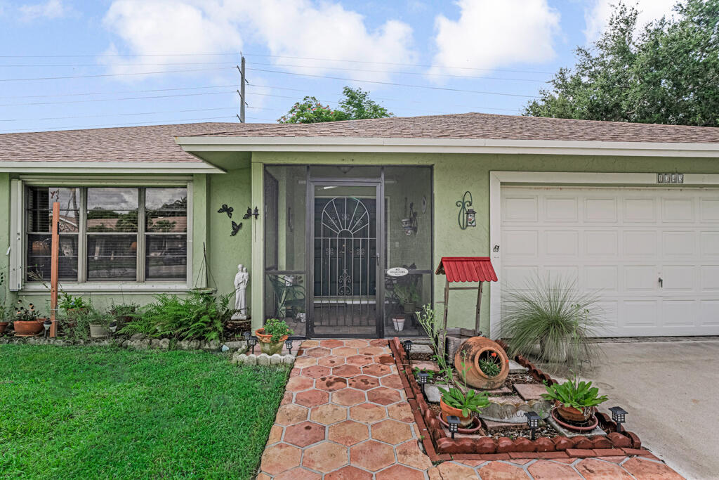 Property Photo: 1743 Shower Tree Way FL 33414