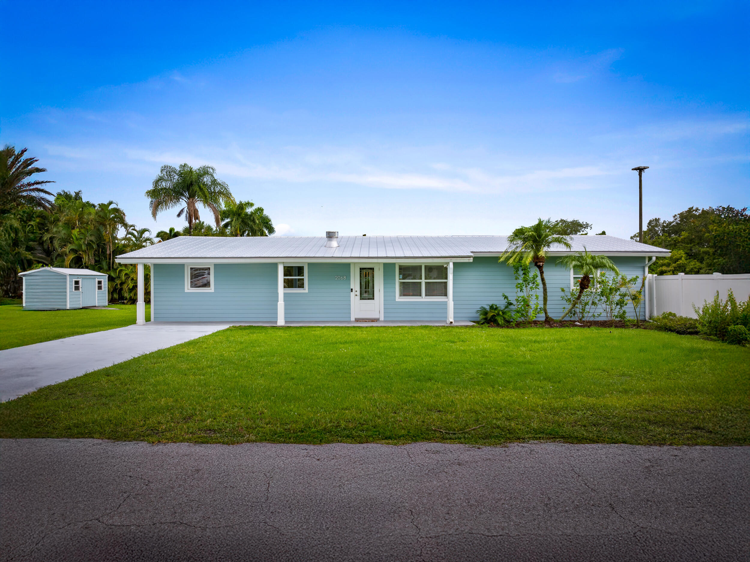 Property Photo: 2068 NW Azalea Street FL 34994