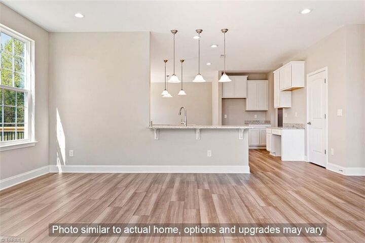 Property Photo:  8107 Back Nine Drive 65  NC 27357 