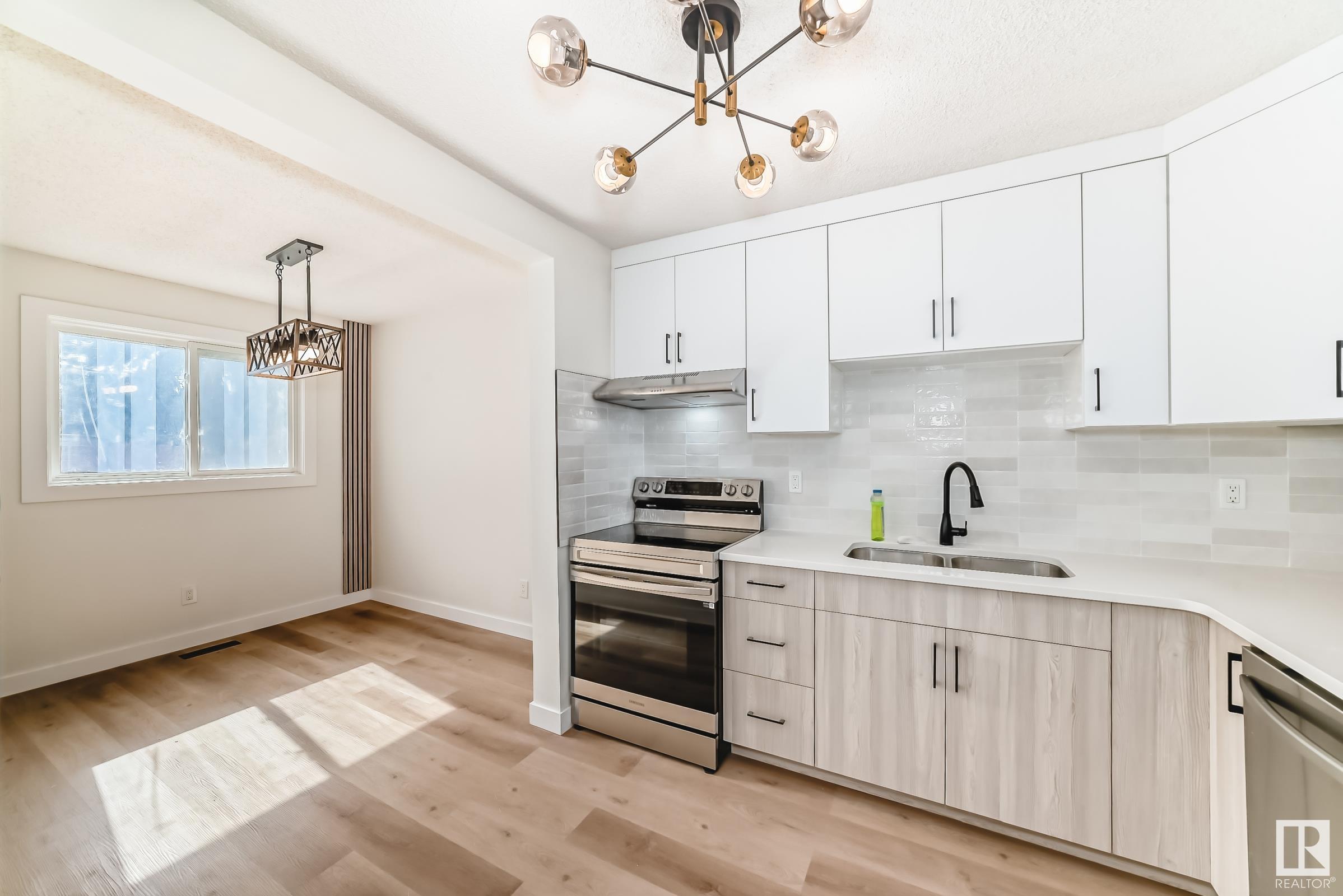 Property Photo: 14233 23 Street NW AB T5Y 1E8