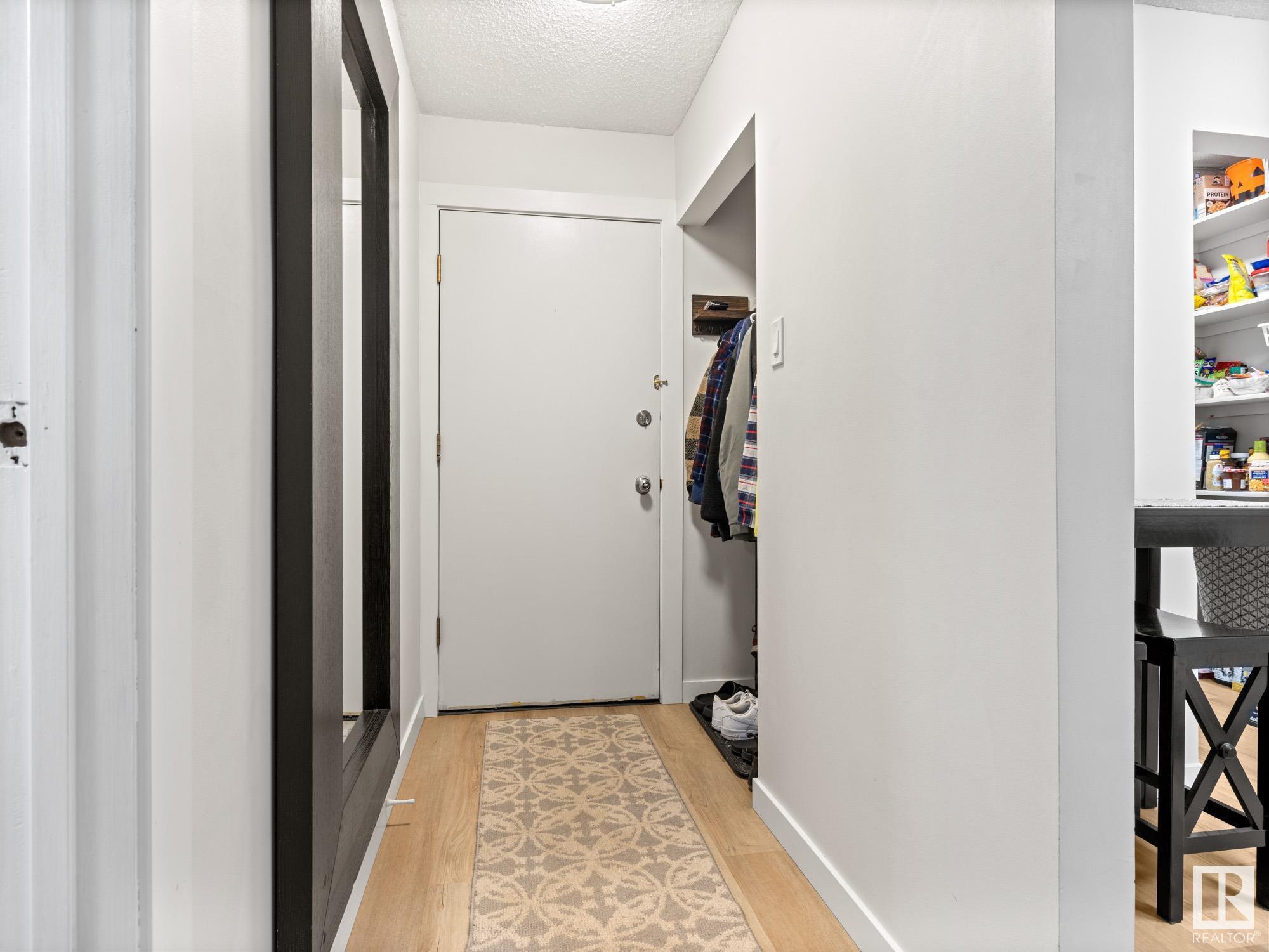 Property Photo:  2323 119 Street NW 219  AB T6J 4E2 