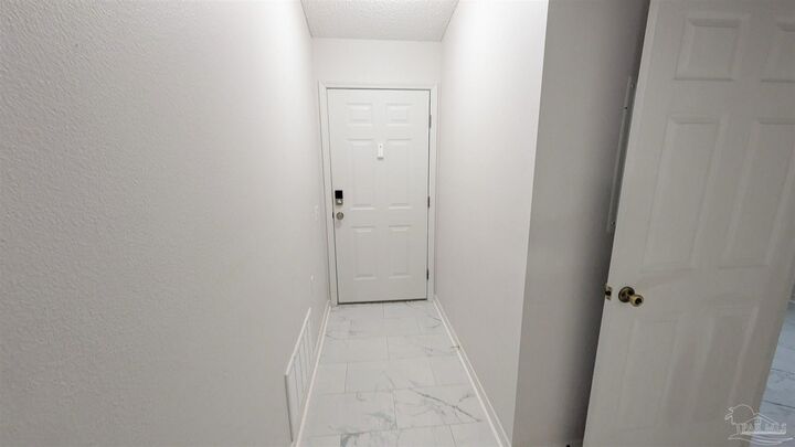 Property Photo:  8124 Heirloom Dr  FL 32514 