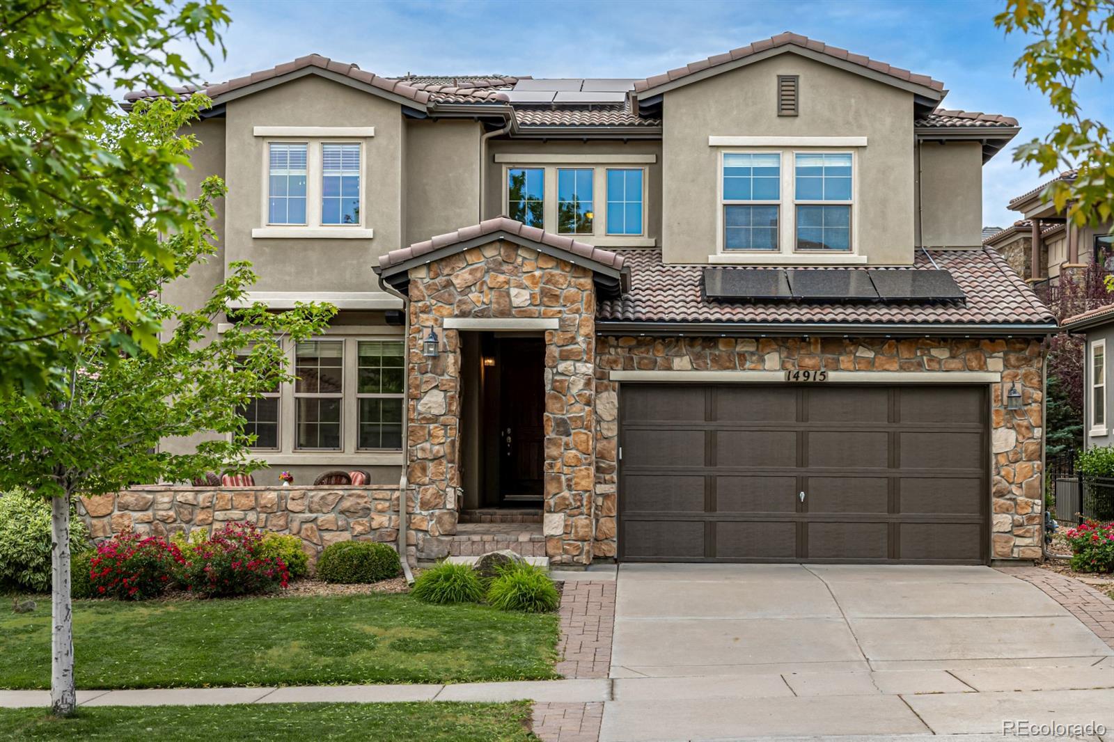 Property Photo: 14915 W Warren Avenue CO 80228