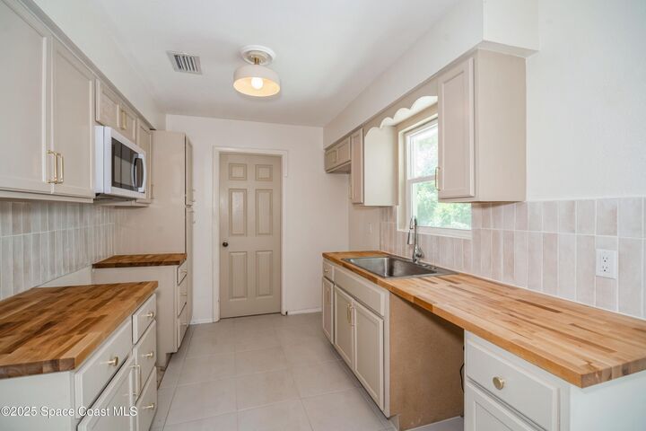 Property Photo:  1671 Ollie Street  FL 32922 