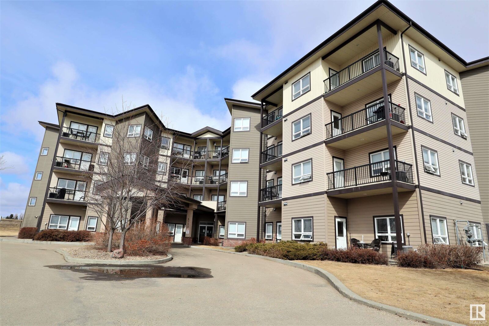 Property Photo: 8702 Southfort Drive 312 AB T8L 4R6