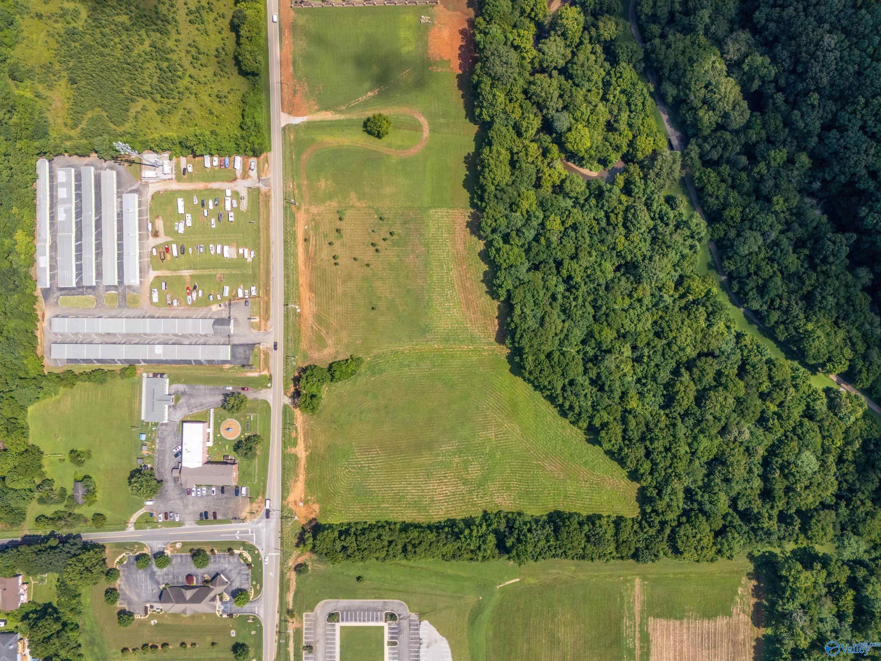 Property Photo:  5.6 Acres S Slaughter Road  AL 35758 