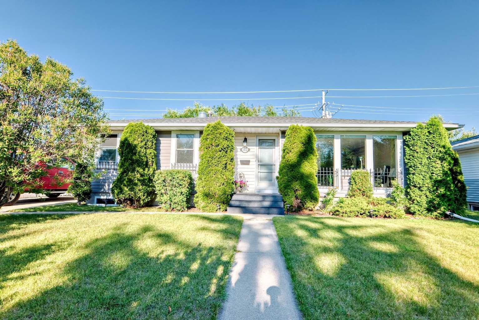 Property Photo:  143 Waskatenau Crescent SW  AB T3C 2X7 