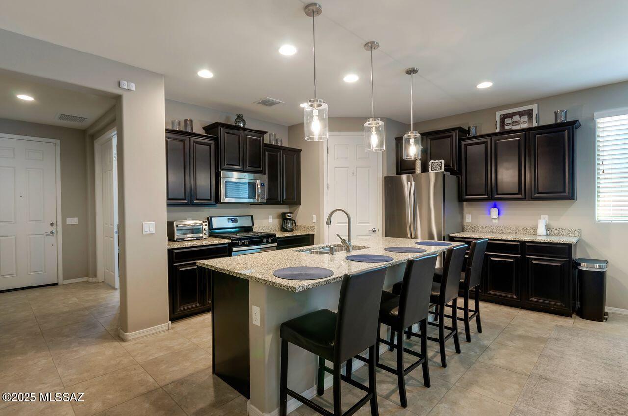 Property Photo: 11056 E Actinidia Place AZ 85747