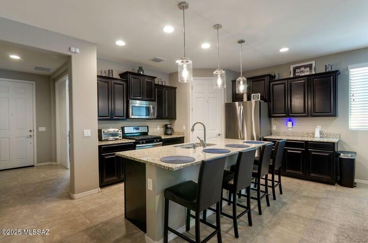 Property Photo:  11056 E Actinidia Place  AZ 85747 