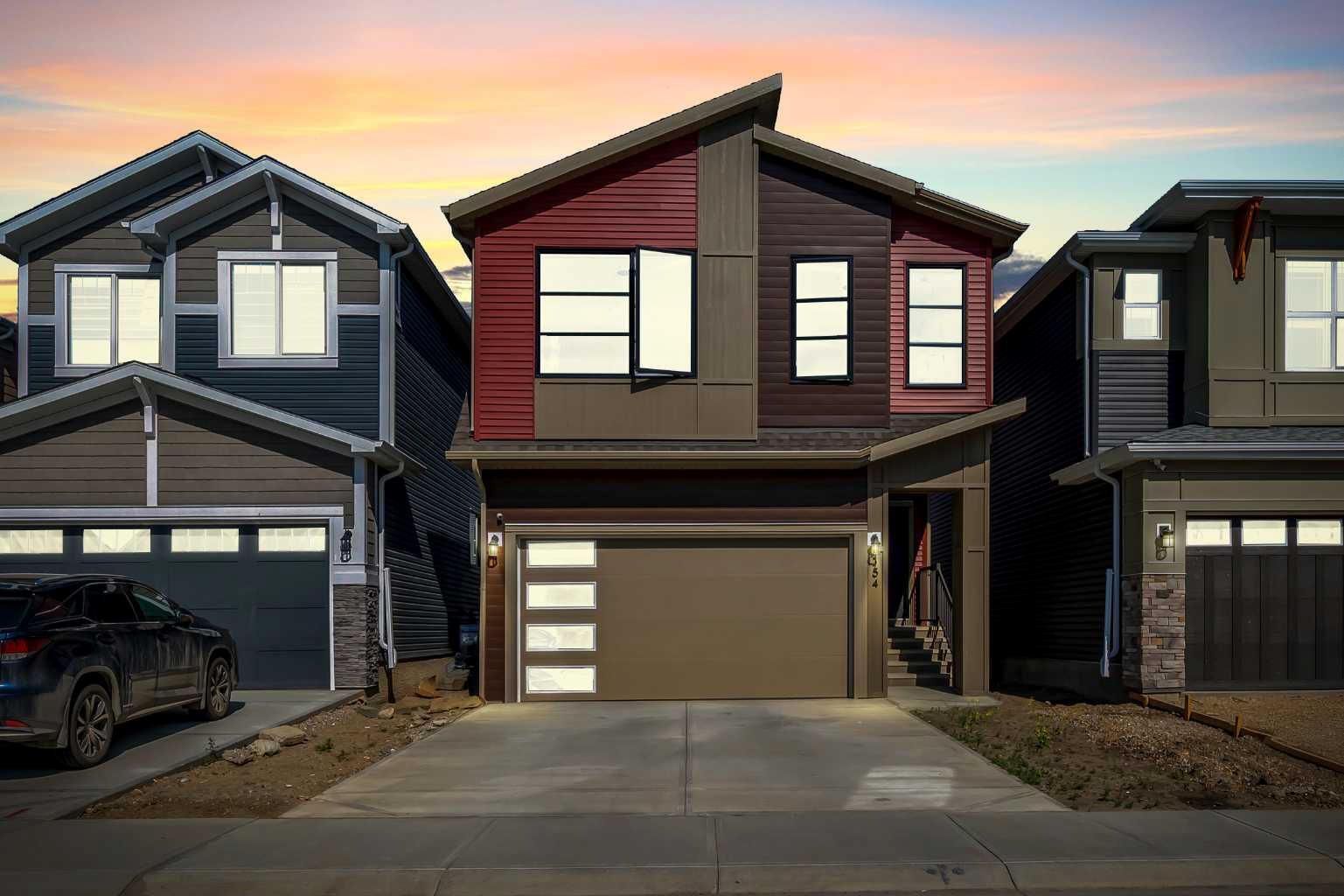Property Photo: 154 Silver Spruce Grove SW AB T2X 5M2