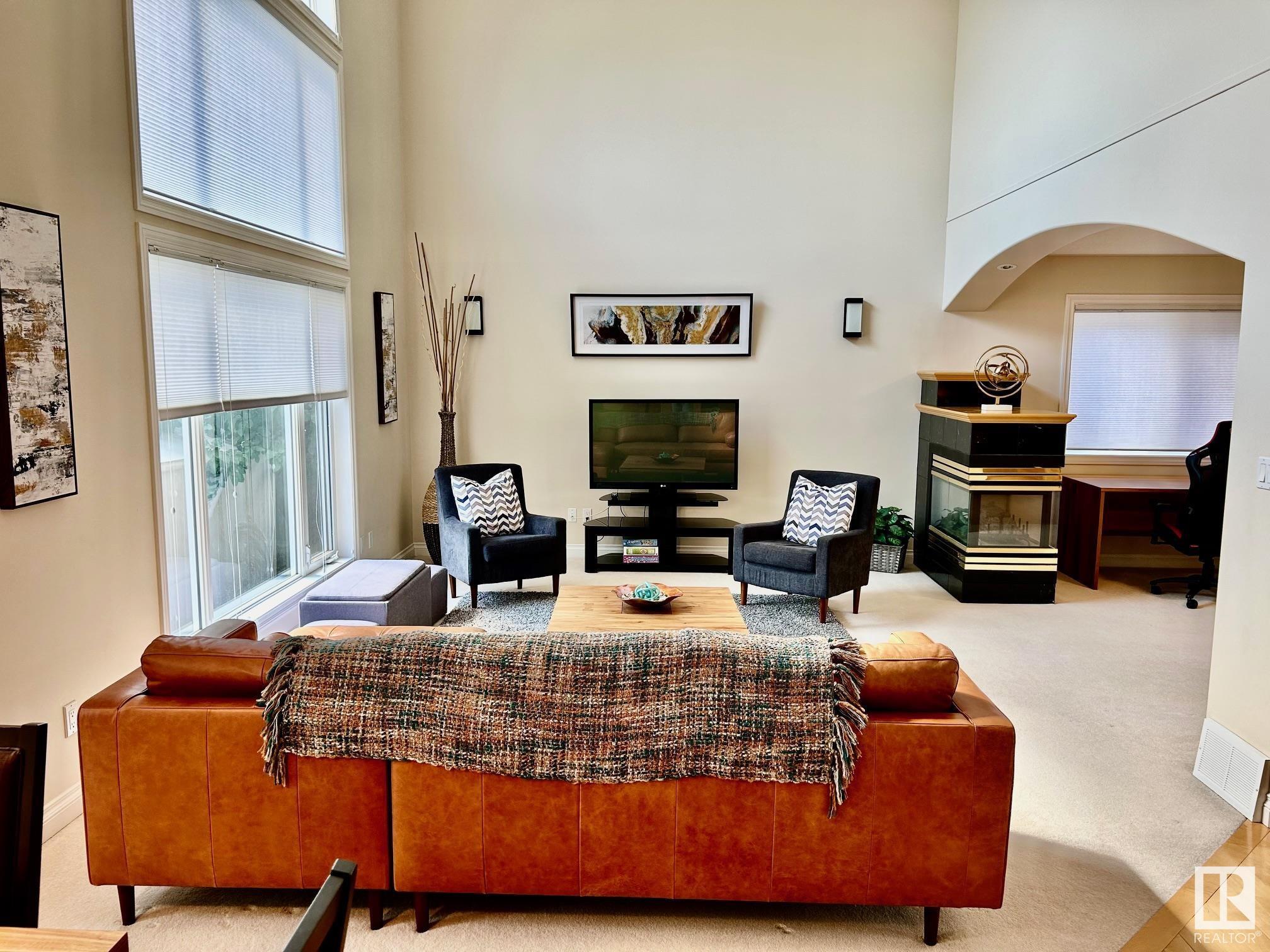 Property Photo:  11551 14 Avenue NW  AB T6J 7B3 