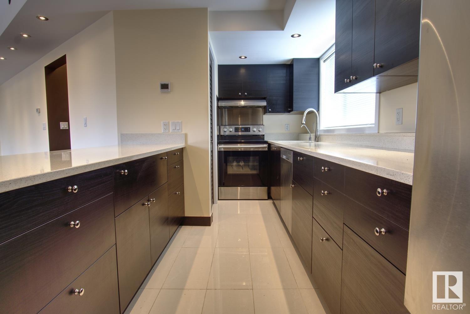 Property Photo:  12803 65 Street NW  AB T5A 1L4 