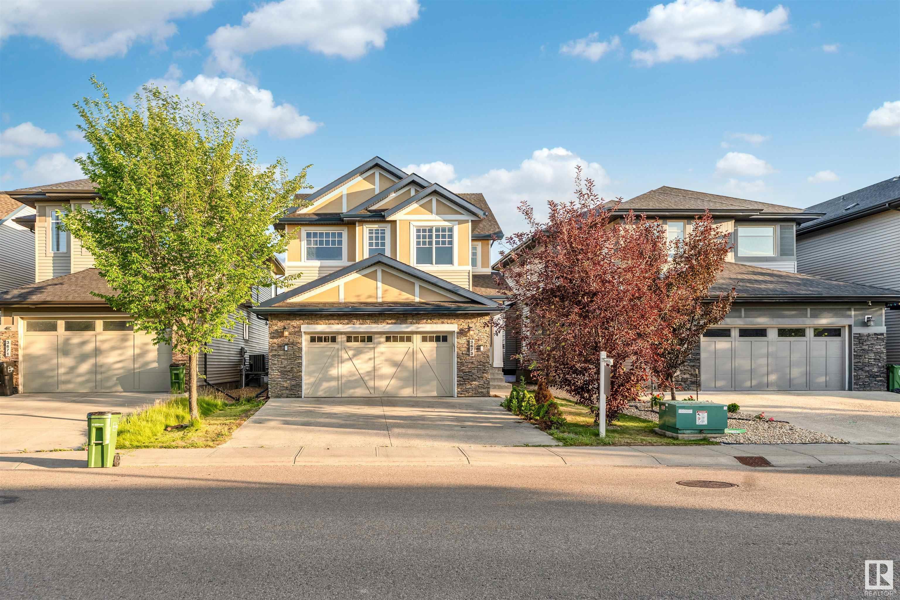 Property Photo: 3673 Allan Drive SW AB T6W 2K3