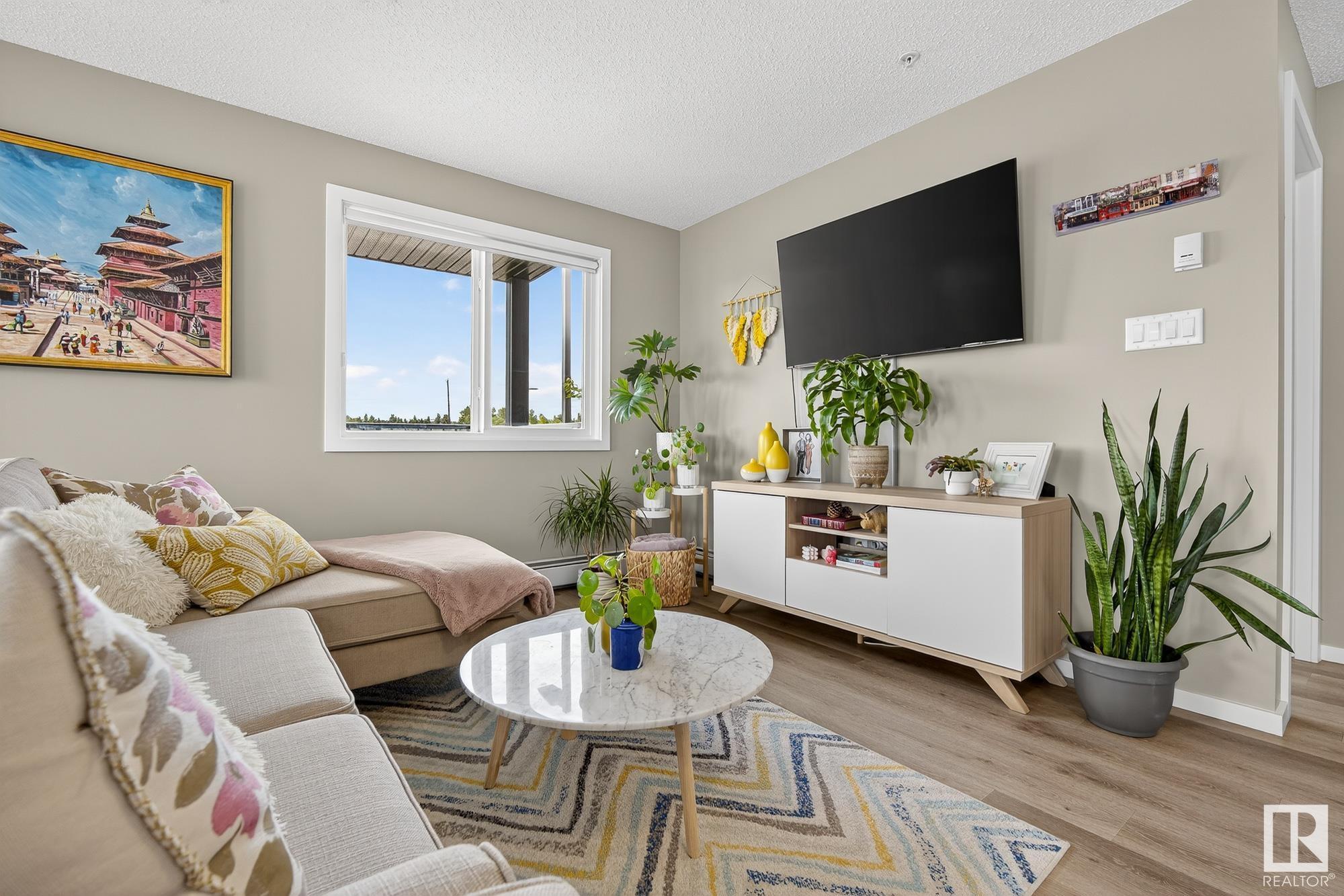 Property Photo: 148 Ebbers Boulevard NW 237 AB T5Y 4A4