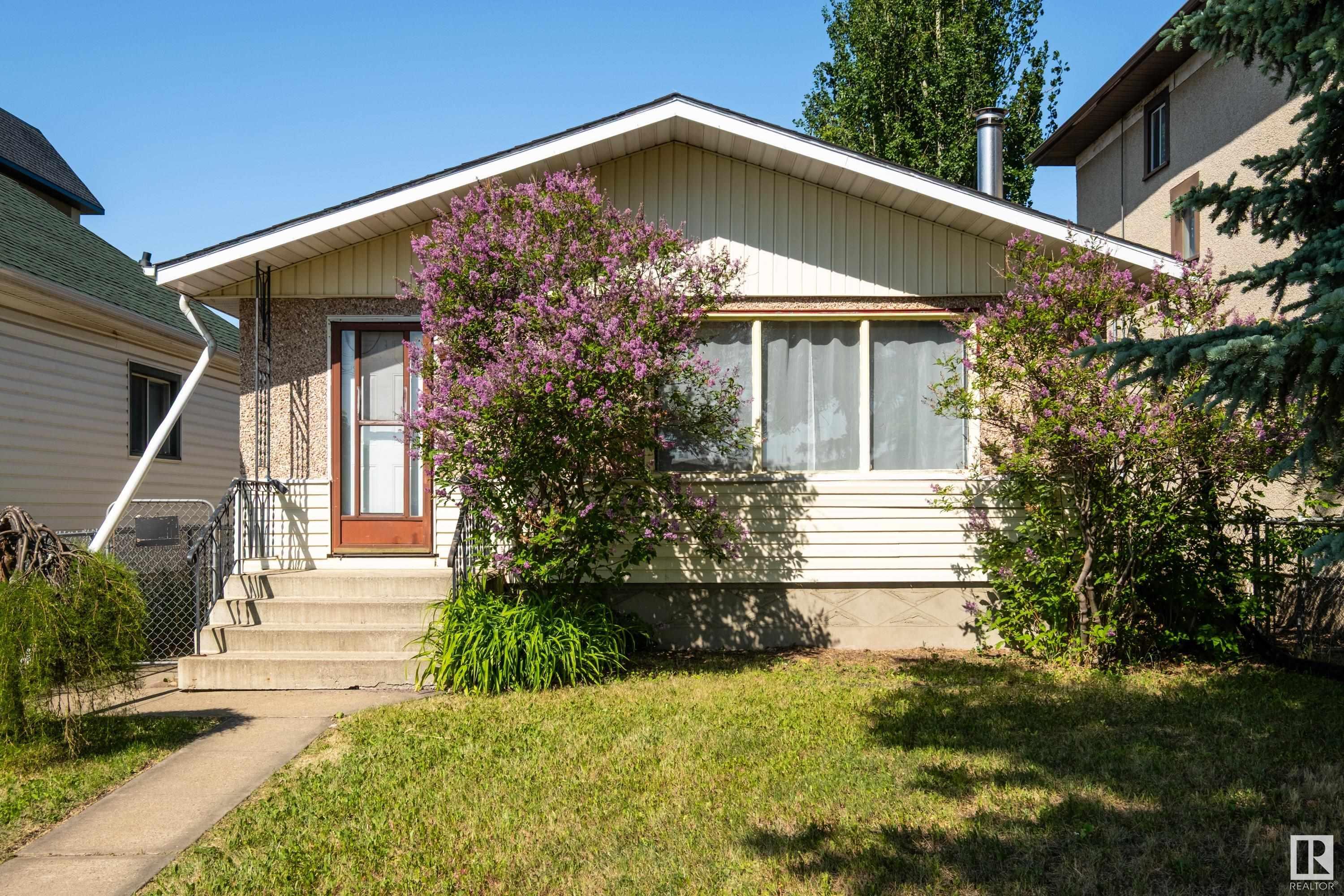 Property Photo: 11406 81 Street NW AB T5B 2R6