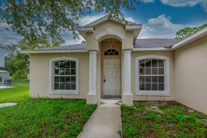 Property Photo: 1990 SE Floresta Drive FL 34983